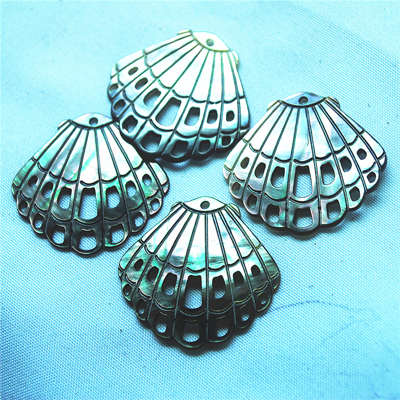 Women'S Accessories Nz - 4 STUKS ZWARTE SHELL HANGERS CARVING